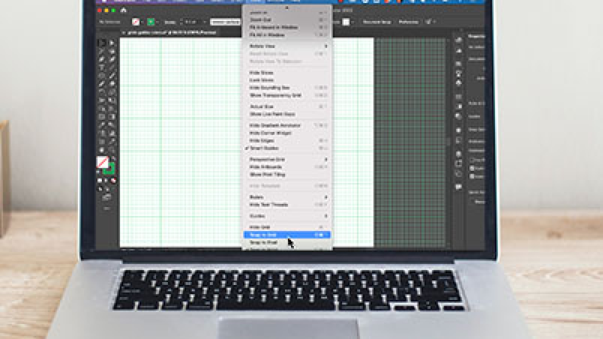 Laptop mockup with Illustrator screen